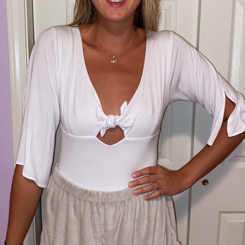 Soft White quarter sleeve body suit